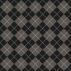 Halloween Argyle plaid. Scottish pattern in gray, black and white rhombuses. Scottish cage. Traditional Scottish background of diamonds. Seamless fabric texture. Vector illustration