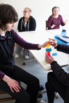 Special Needs Young Adults in Classroom.