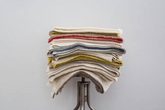Stool with stack of wool blankets