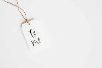 simple handwritten tag to show giving yourself a gift