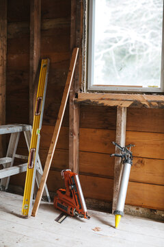 Construction tools - nailer, level and caulking gun