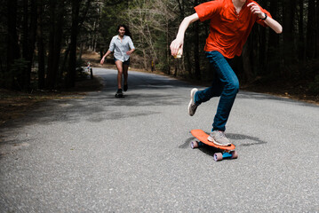 stock photos of teens skate boarding