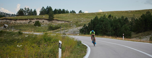 triathlon athlete riding bike