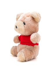 Teddy bear doll with red shirt on a white background