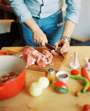 Man cutting the meat
