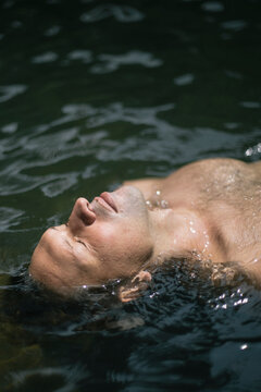 Man Relaxing in Water