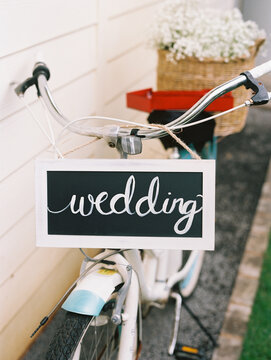wedding sign on bicycle