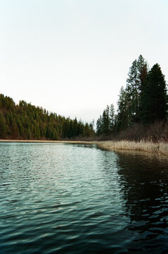 Small quiet lake in the mountains of Idaho.