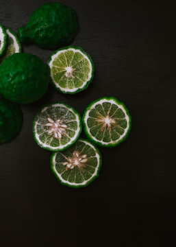 kaffir lime on black plate