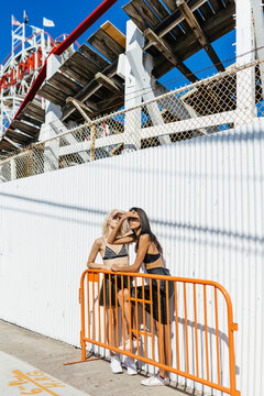 Female Fashionable Friends Out in Coney Island . Us New york Cit