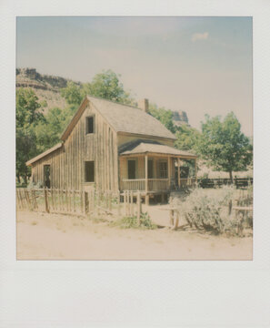 Polaroid image of an uninhabited wooden house in a US ghost town
