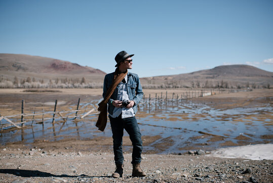 Deteriorated corpse of cow with skeleton looking out of skin.