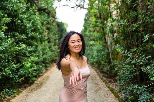 Young Filipino Woman Visiting Italian Garden Maze
