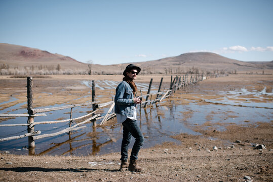 Deteriorated corpse of cow with skeleton looking out of skin.