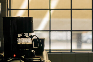 Morning coffe on they kitchen