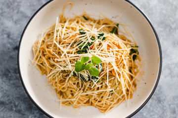 plant-based food,  vegan mushroom spaghetti with dairy-free parmesan topping