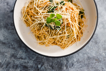 plant-based food,  vegan mushroom spaghetti with dairy-free parmesan topping