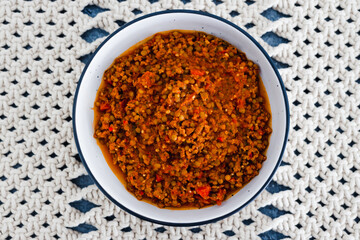 plant-based food, vegan bolognaise ragu sauce with lentils diced tomatoes and textured vegetable protein with mixed herbs and spices