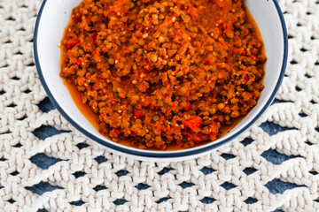 plant-based food, vegan bolognaise ragu sauce with lentils diced tomatoes and textured vegetable protein with mixed herbs and spices