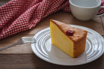 Butter cake sliced on white plate