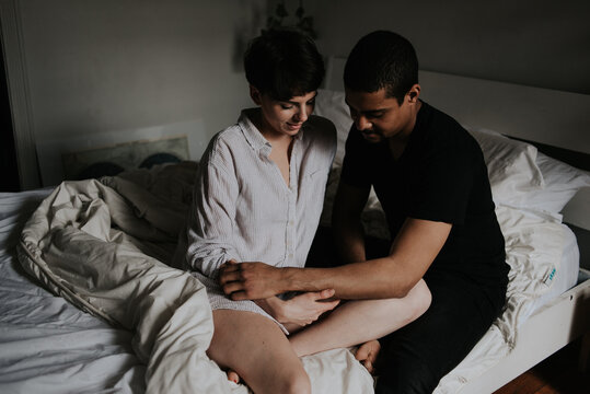Intimate couple shoot in their bedroom