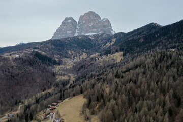 aerial snow covered mountain peaks in alps at winter 
