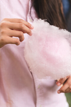 eating pink fairy floss