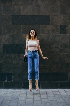 Happy woman jumping