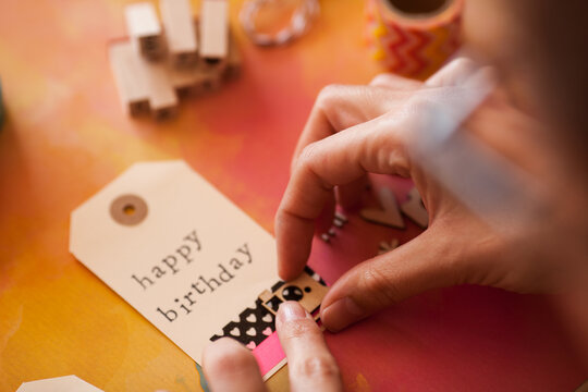 woman making scrapbook design