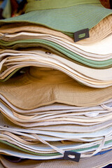 Hats for sale in a street market.