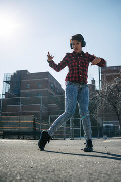 Young woman during krump break dance in Williamsburg, Brooklyn