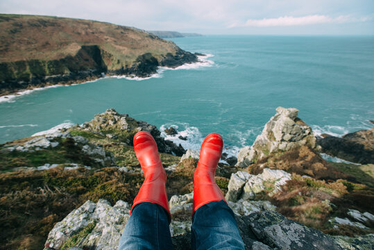Feet looking over cliff