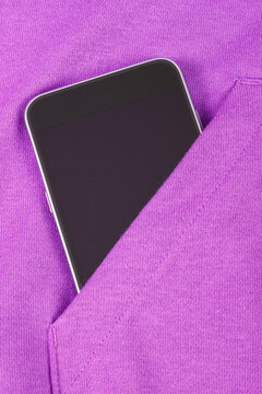 Mobile phone with blank screen in pocket sweatshirt, smartphone