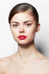 Fototapeta premium Woman with bared shoulders and red lips sexy look 