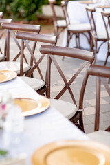 Rustic brown wedding chair setup on a wedding day