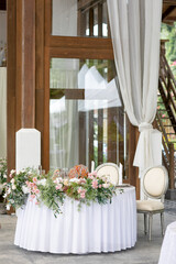wedding dining table setup at rustic wedding hall