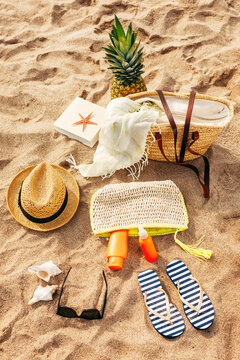 Summer still life on the sand, with lot of beach related objects.