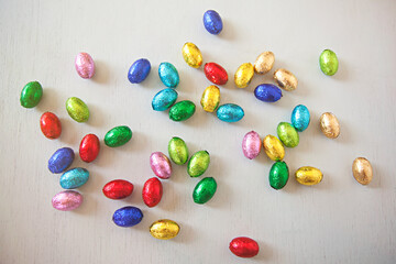 colourful chocolate Easter eggs on table