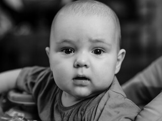 black and white close portrait of baby boy