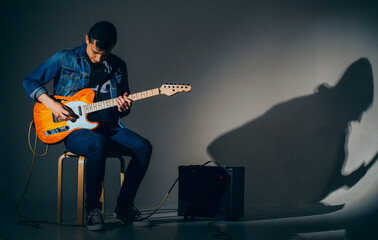 guitarist plays