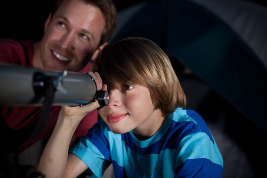 Camping: Boy Looks Through Telescope
