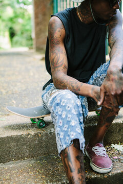 Anonymous man with skateboard