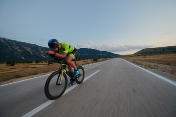 triathlon athlete riding bike