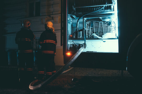 firefighters at night