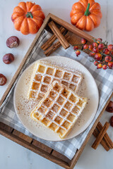 sweet home made pumpkin spice waffles on a table
