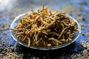 Close up shot of Gujarati famous tea-time snack dish Bhavnagiri gathiya in a serving plate. Shot of freshly prepared thikkha bhavnagari gathiya in a serving plate.