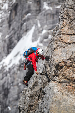 mountain climber in high alpine terrain