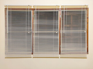 Window blinds in light yellow room, Interior design concept