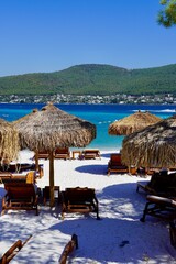 Bodrum, Turkey - August 2020: Hotel beach Lujo. Vacation in Paradise. Beautiful tropical beach banner. White sand travel tourism wide panorama background concept. Amazing beach landscape, yachts