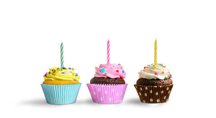 Birthday cupcakes with candles on a white background